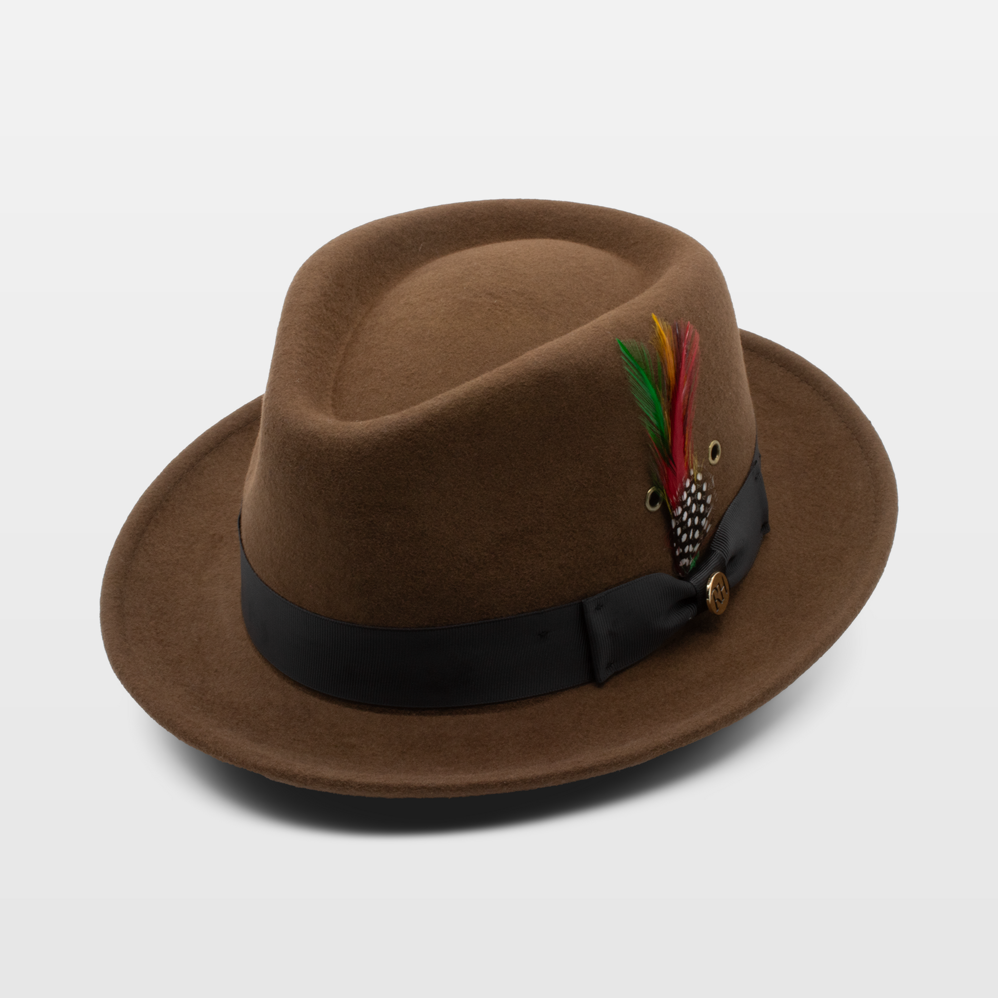 Brown fedora hat with a black band and a decorative feather