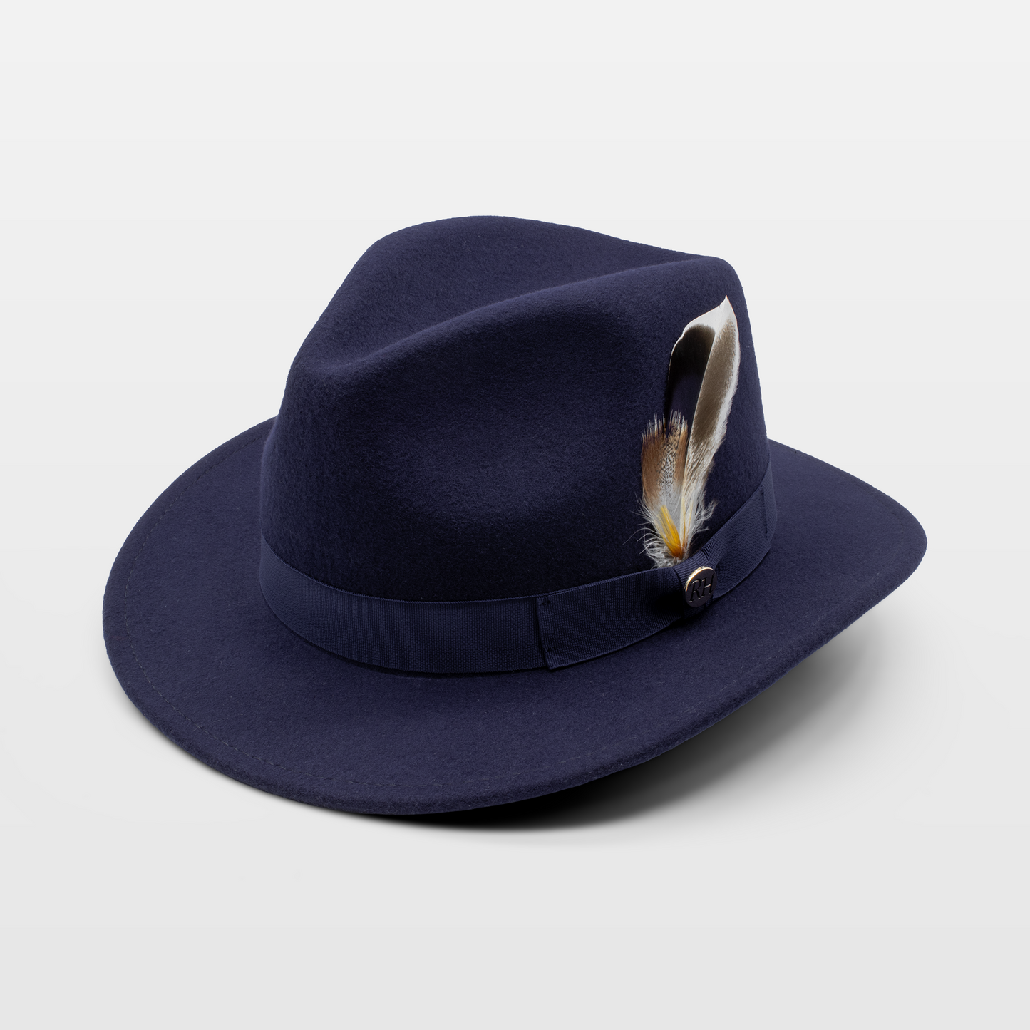 Classic navy felt hat with a decorative feather, featuring a sleek band and RH logo pin