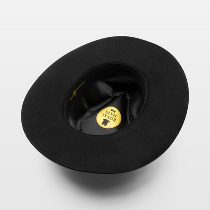 Black wide-brim hat shown from the inside with a gold and black Royal Hats logo