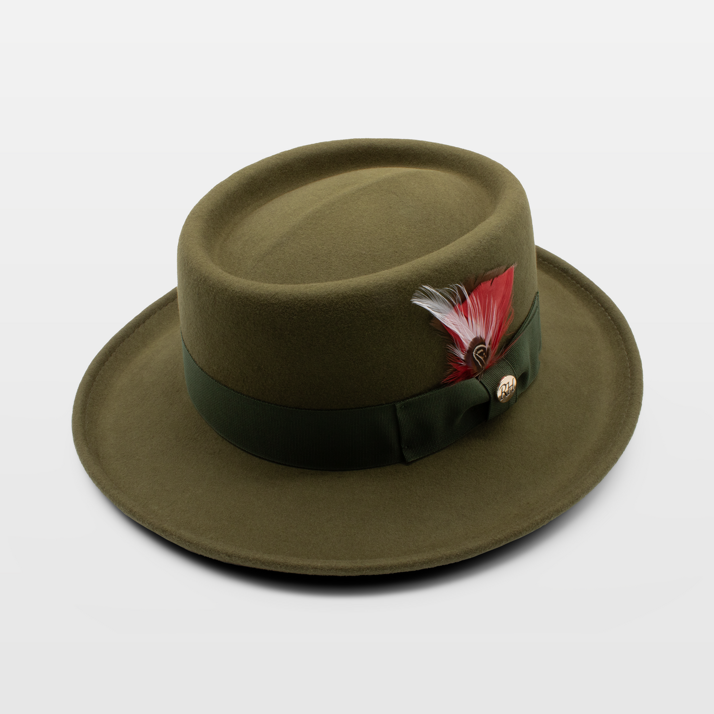 Olive-green felt hat with a wide brim, green band, and a red feather accent