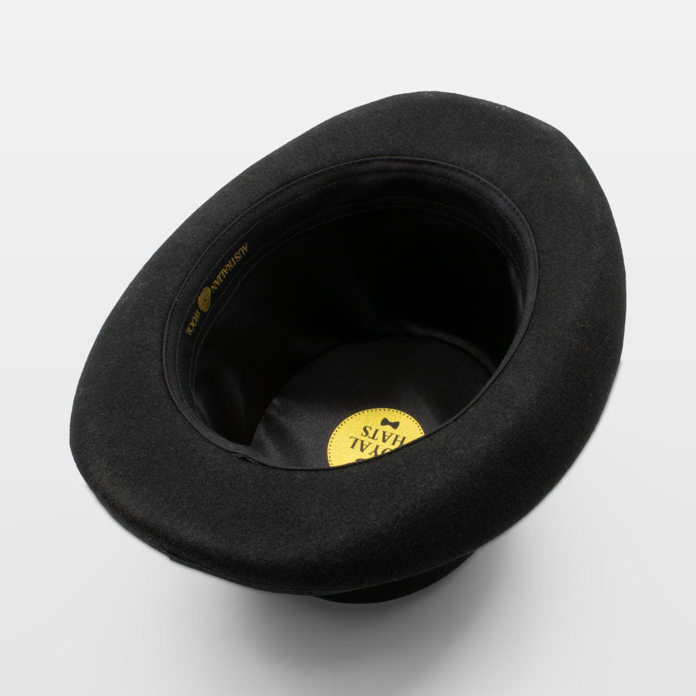 Black felt hat interior with a Royal Hats label and black satin lining