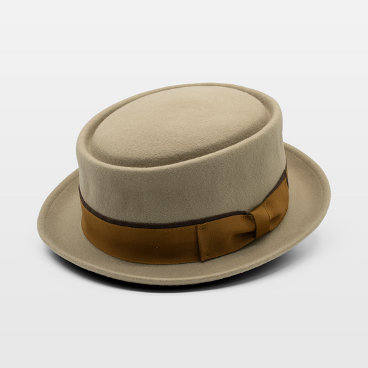 Beige round crown hat with a brown ribbon and bow detail around the base