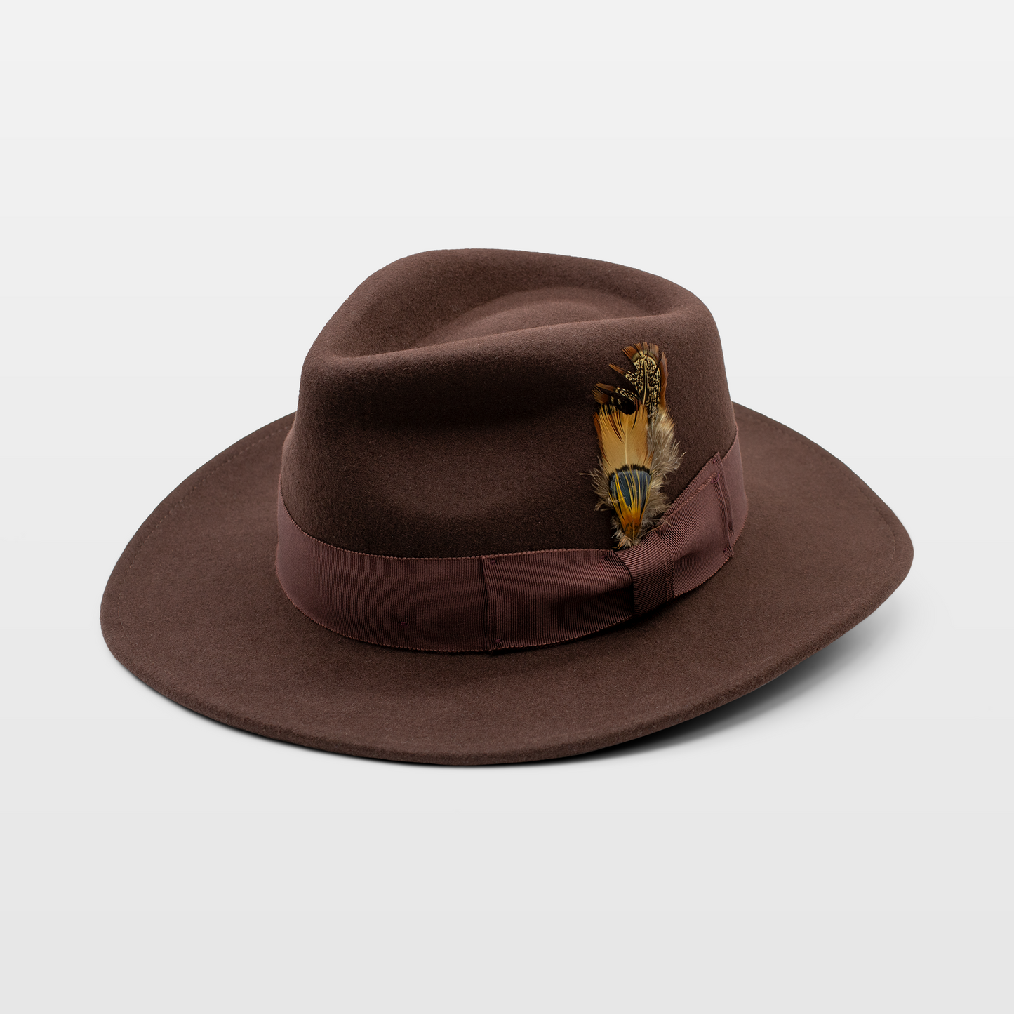 brown felt fedora hat with a matching fabric band, featuring a colorful feather