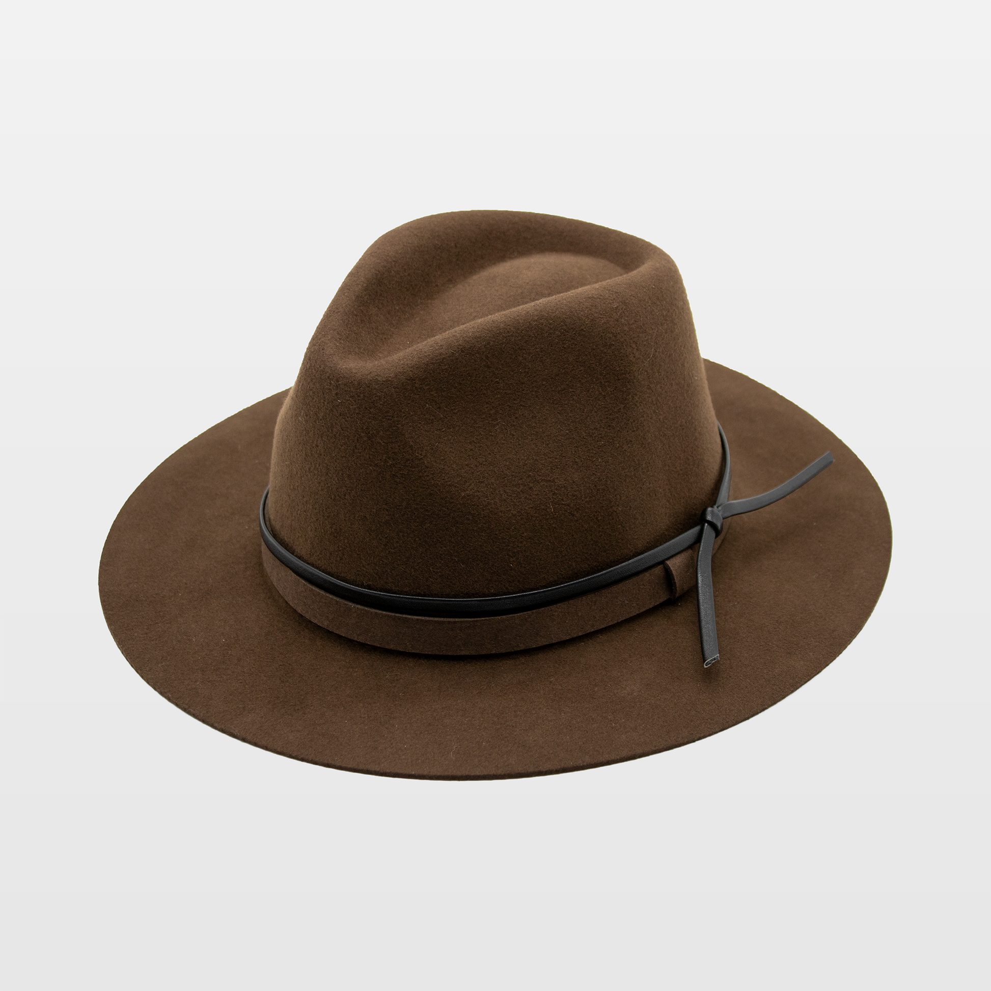 A brown wide-brimmed felt hat with a thin black leather band tied in a knot