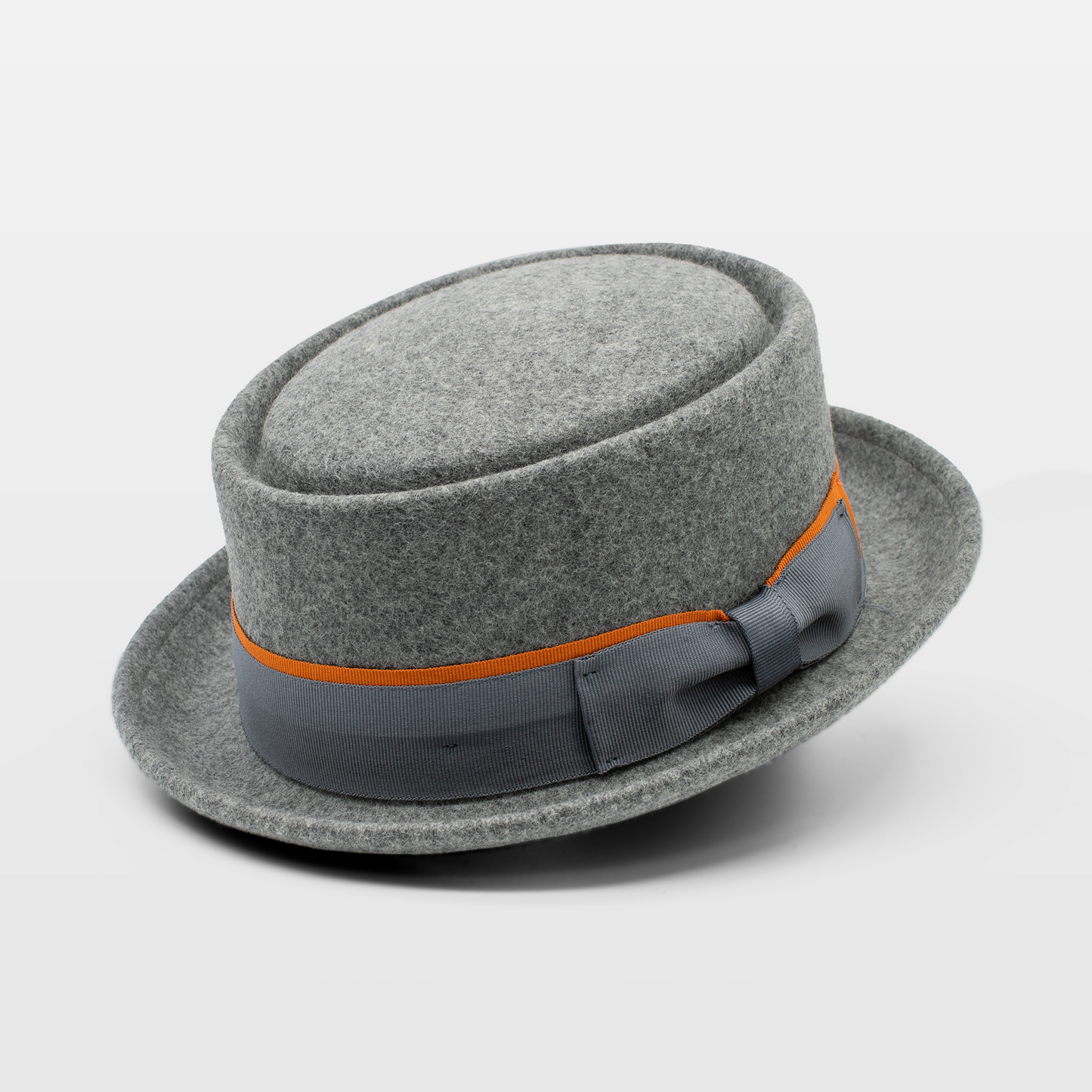 Grey round crown hat with a grey and orange ribbon detail