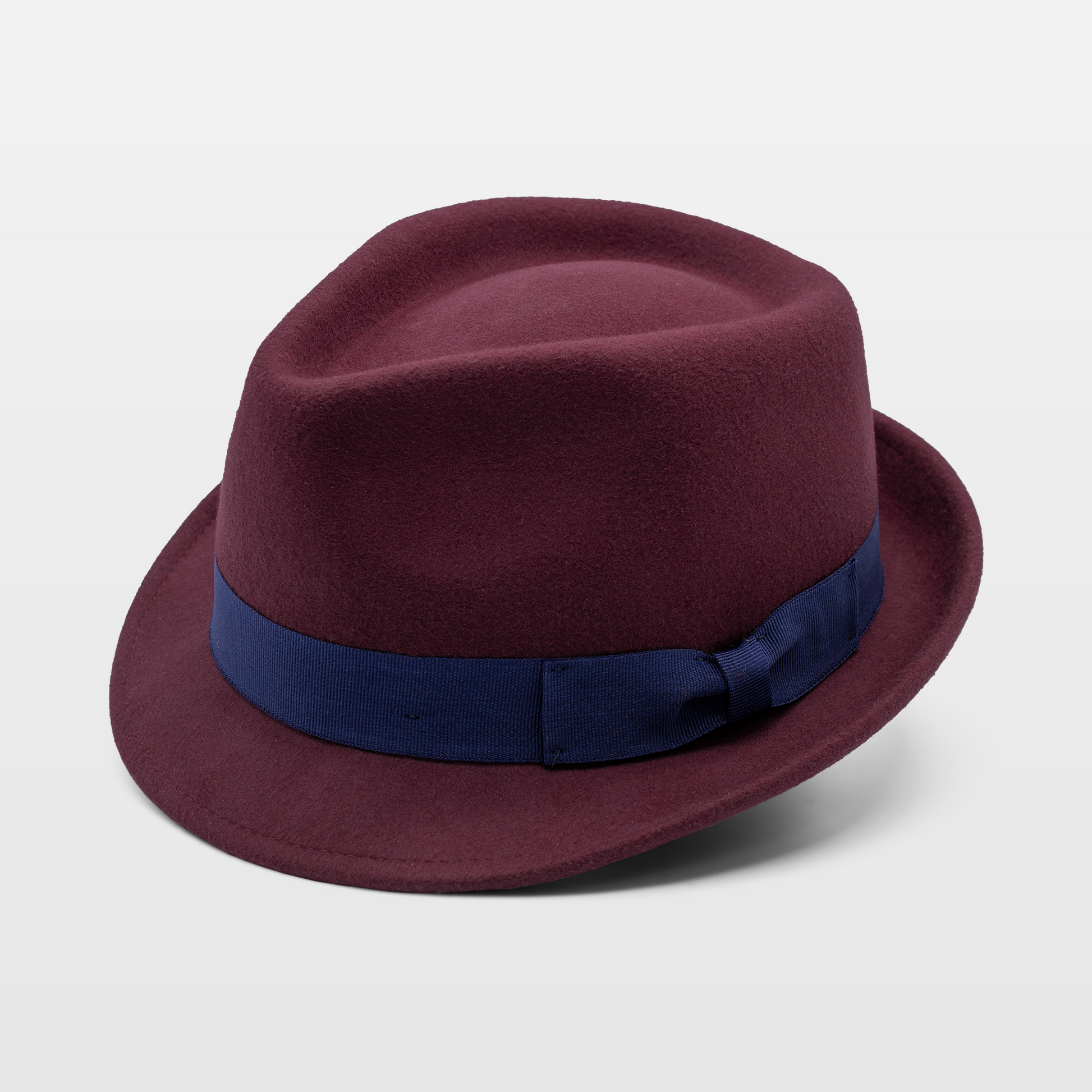 Maroon fedora with a contrasting navy blue ribbon band