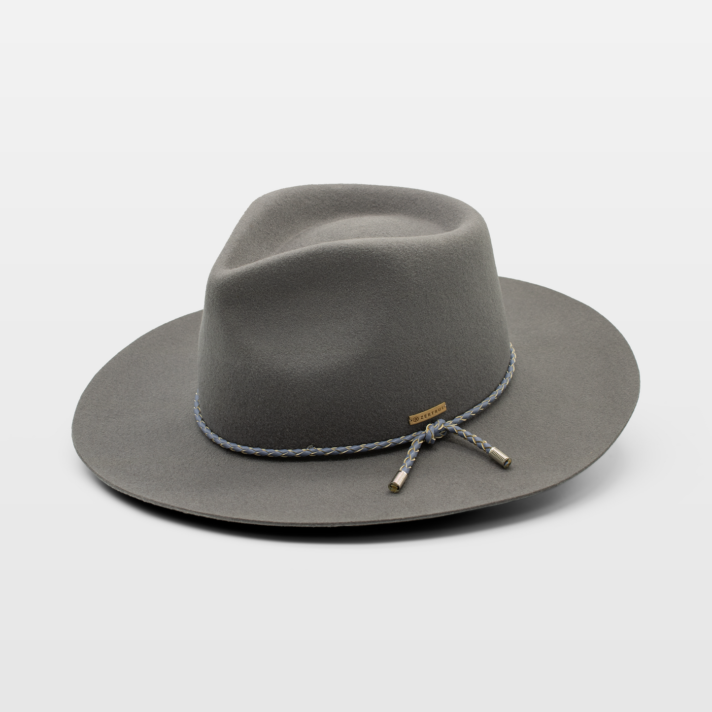 Grey wide-brimmed hat with a braided band and metal accents