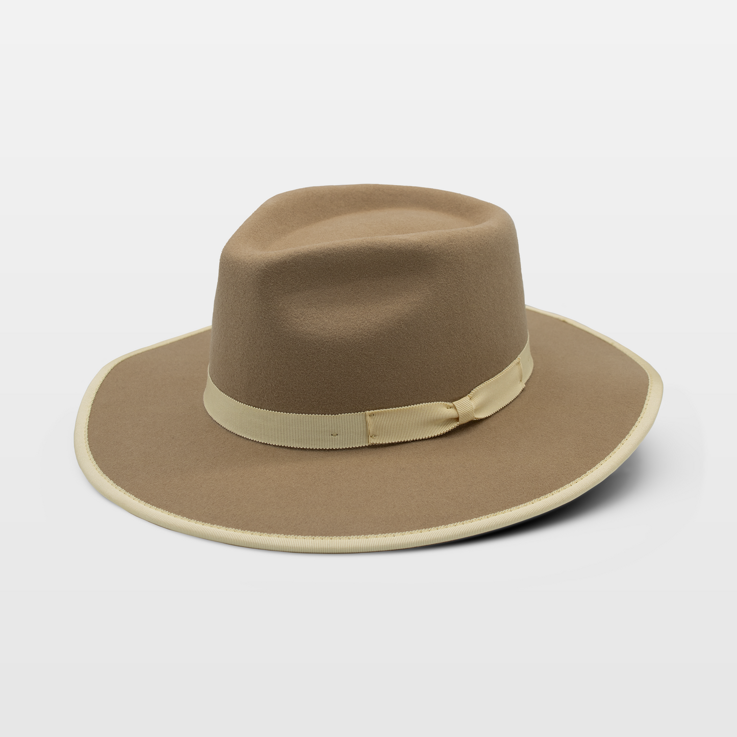 Beige fedora with a cream ribbon band and matching brim edge