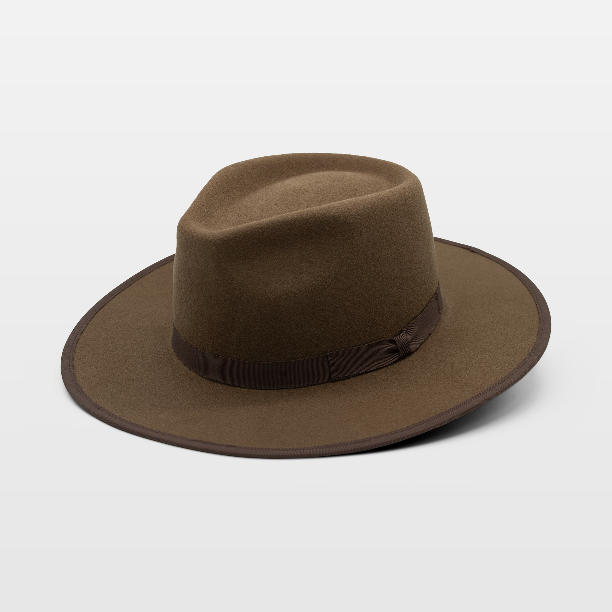 Brown wide-brimmed fedora with a matching ribbon band and dark brown brim edge