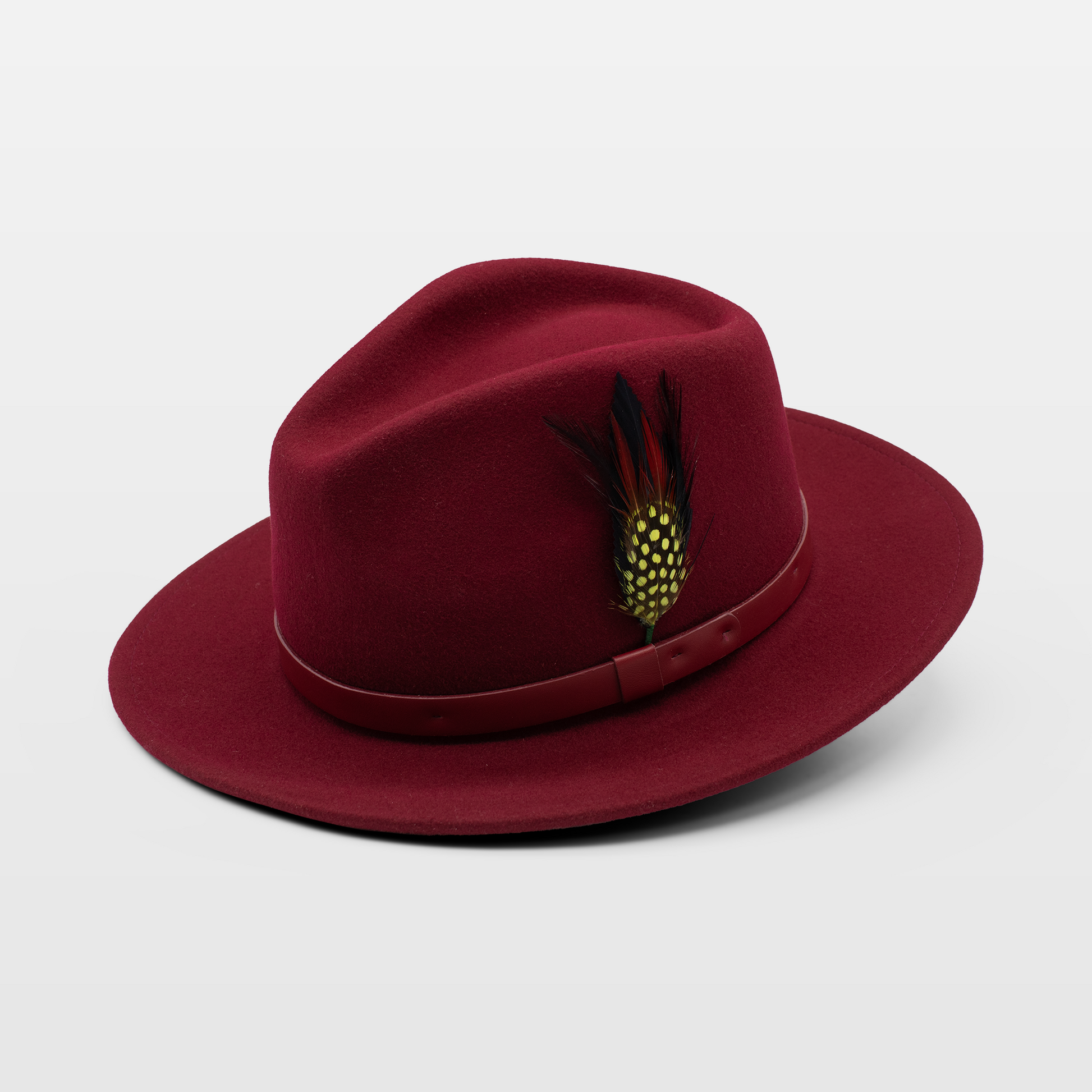 Maroon wide-brimmed hat with a matching band and a decorative feather