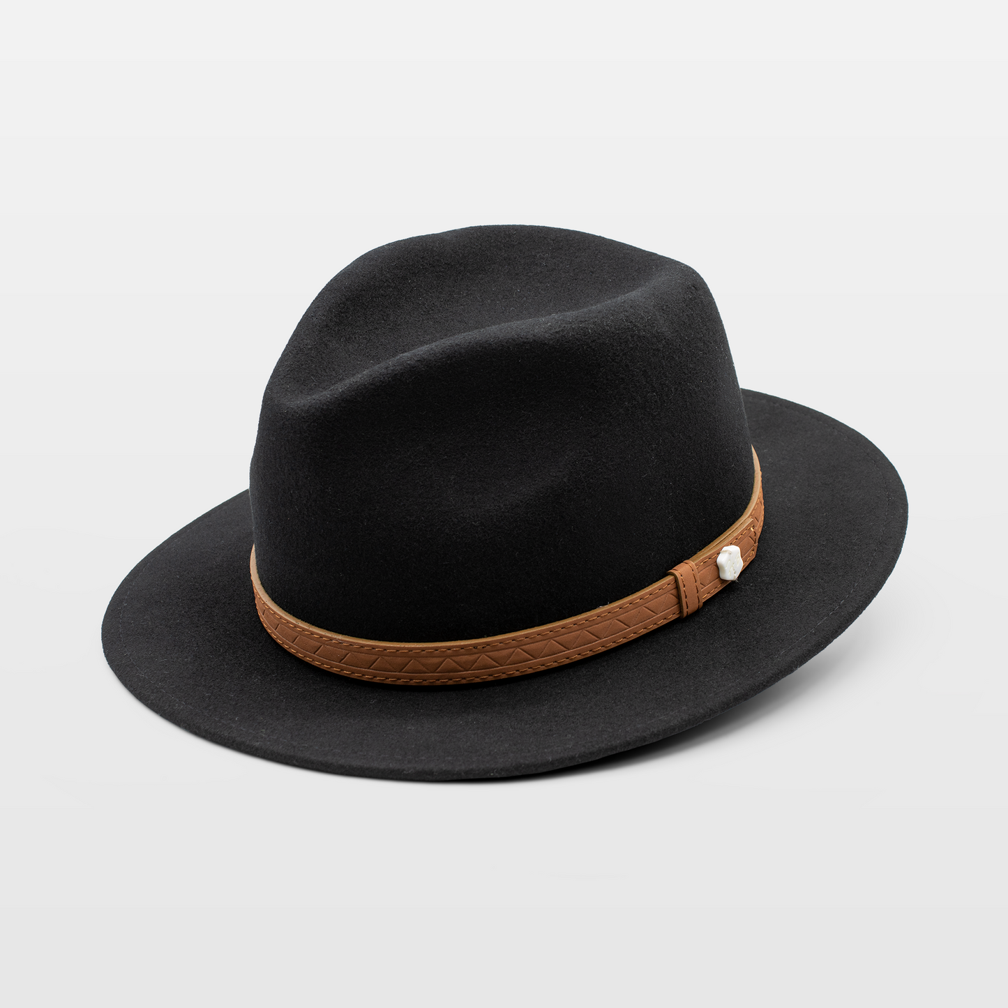 Black fedora with a brown leather band featuring a small white accent