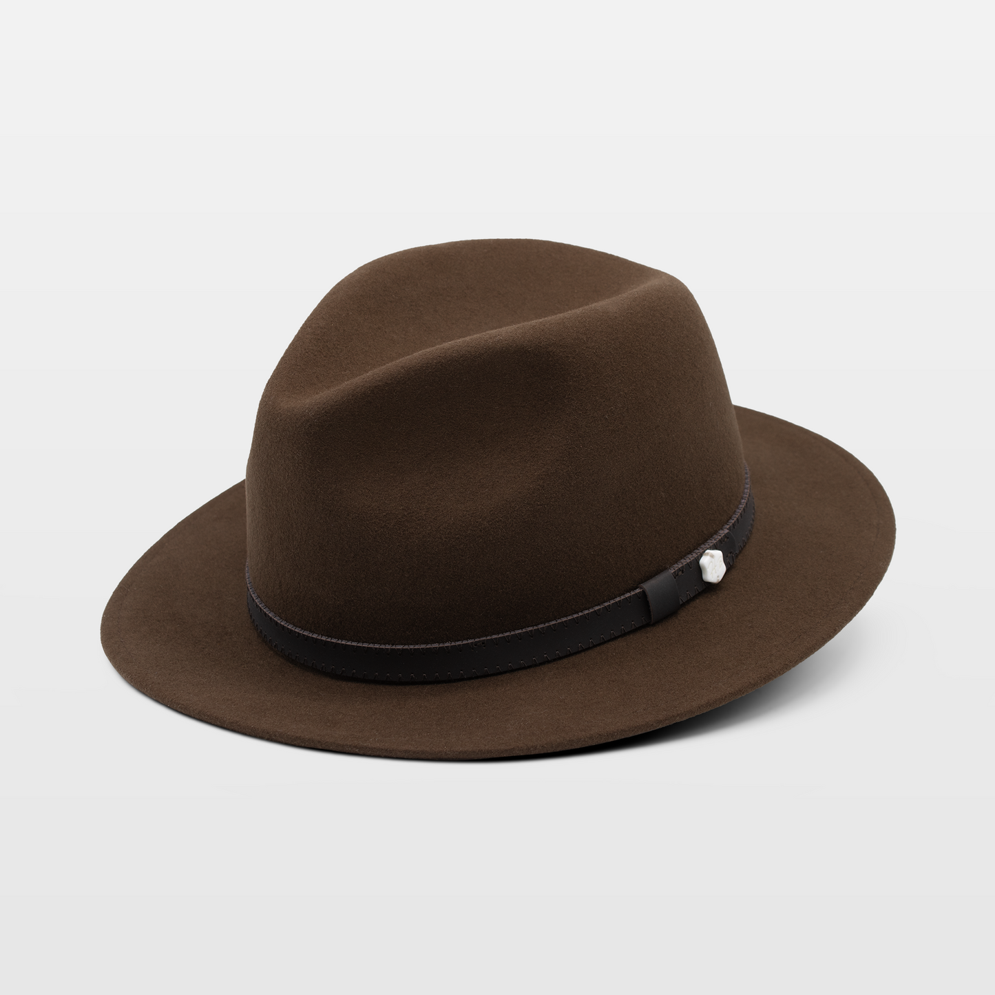 brown felt fedora hat featuring a sleek black leather band around the base of the crown