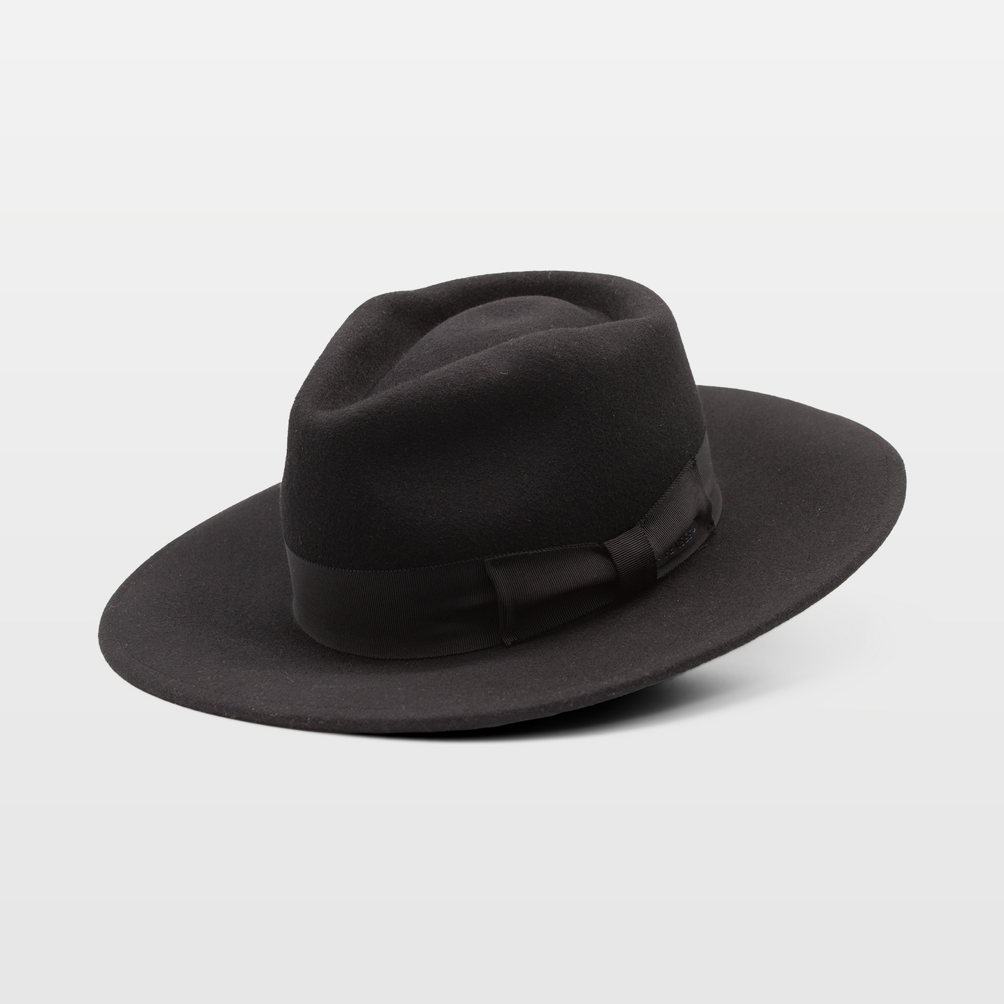 black felt fedora hat with a wide brim and a matching black fabric band tied in a bow