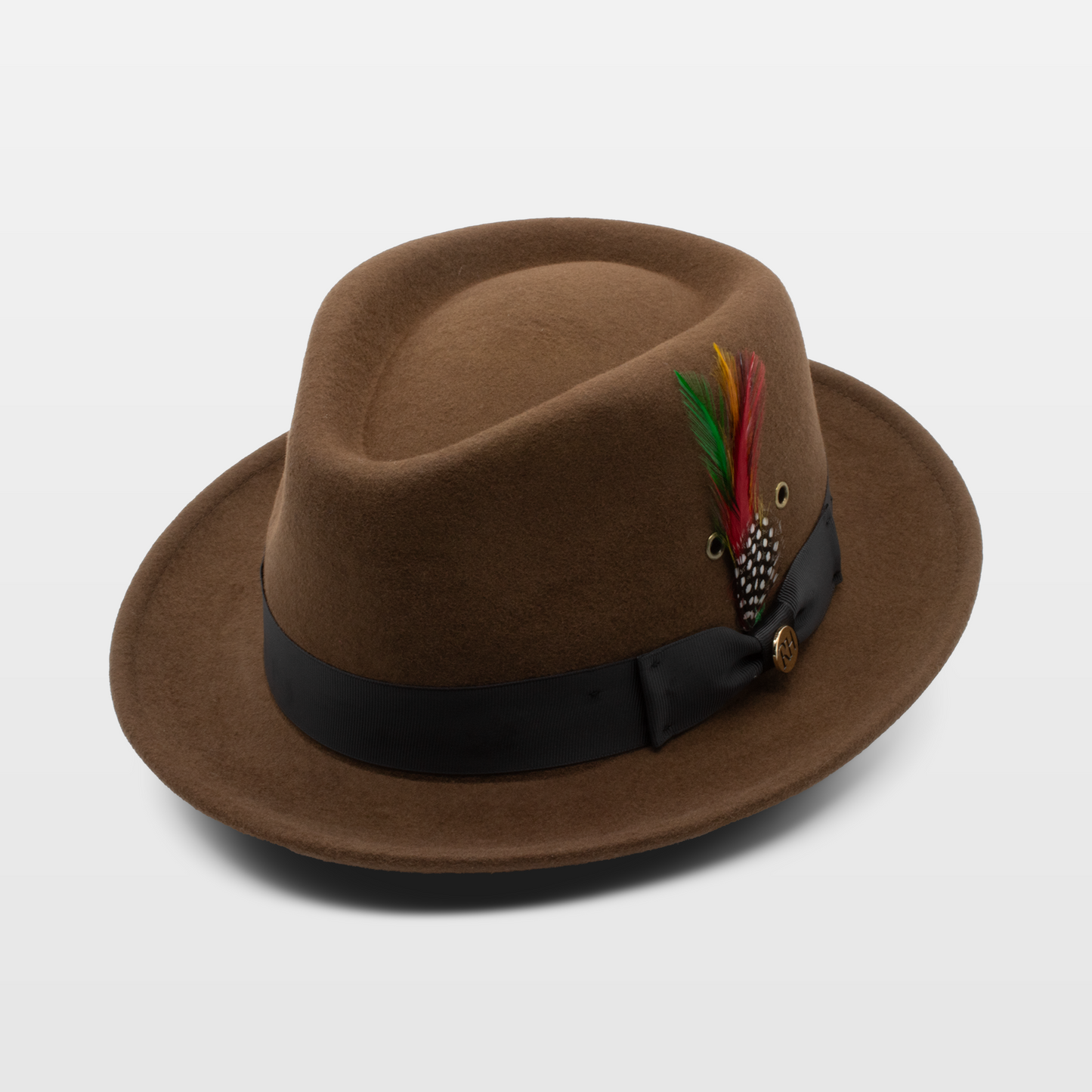 Brown fedora hat with a black band and a decorative feather