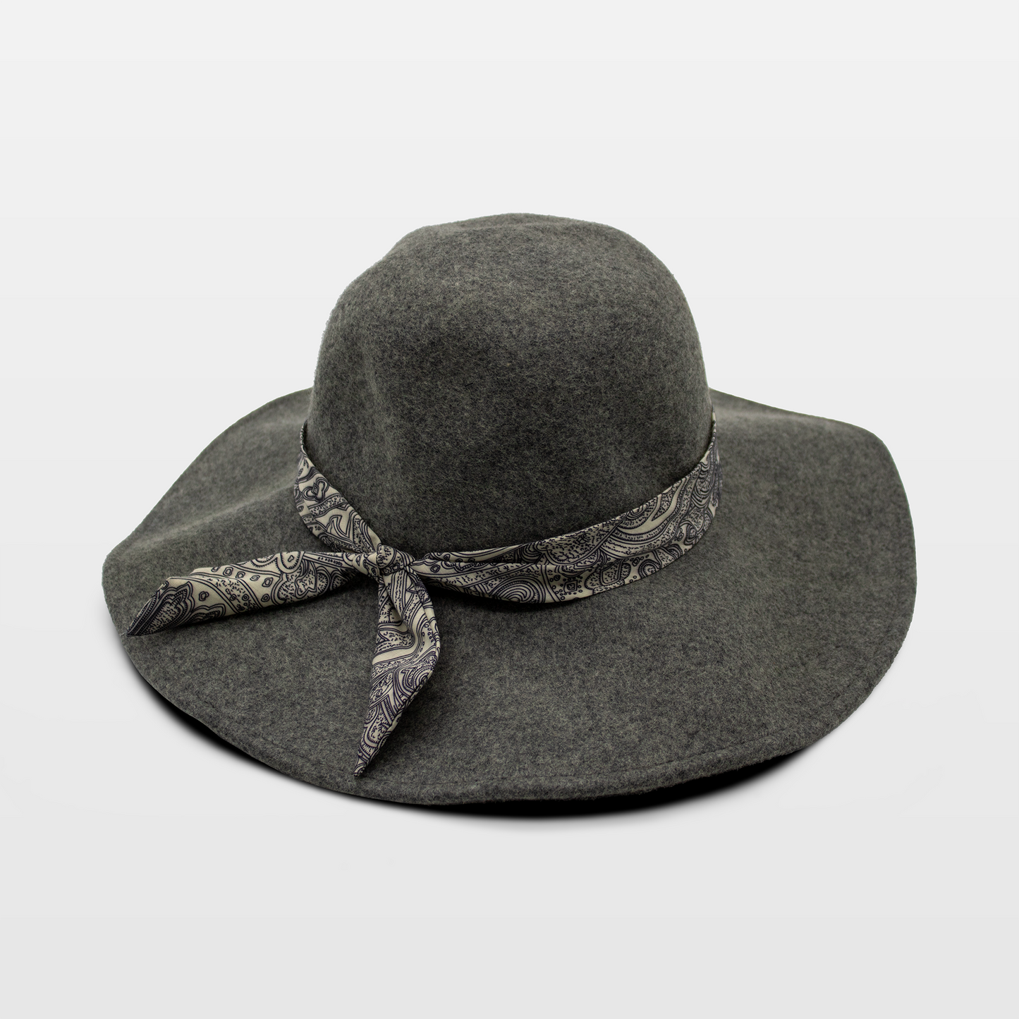 A stylish dark grey hat with a wide brim, adorned with a paisley-patterned band tied in a bow